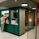 Office break area featuring a coffee station and modern interior design.